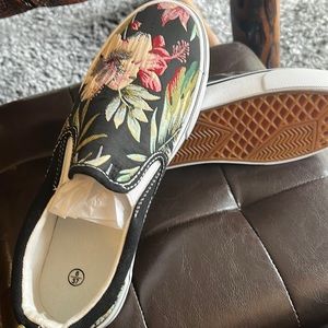 Brand new. Floral sneakers. Never worn.